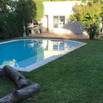 Casa con piscina en Roldán
